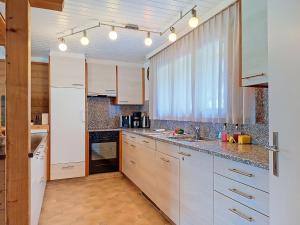 Apartment Chalet Almis 5 by Interhome