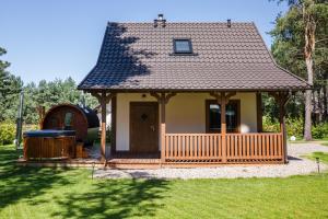 Domek letniskowy Borowik z sauną i jacuzzi - Oaza Spokoju