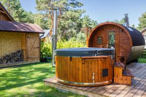 Domek letniskowy Borowik z sauną i jacuzzi - Oaza Spokoju