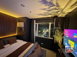DEJA VIEW Studio Condo Unit at Sitari with PlayStation5 and 21st Floor City Skyline view