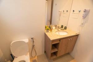 One-Bedroom with Balcony Near Malls Pool and City Views