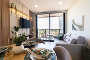 One-Bedroom with Balcony Near Malls Pool and City Views