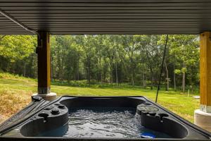 Chalet w Hot Tub, Deck, Game Room & EV Plug