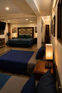 Suite Kwan con alberca privada, terraza y cine