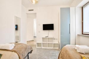 Quiet Oasis In Riva Heart with Balcony Dining - Happy Rentals