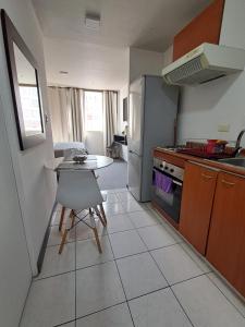 Apartamento equipado con cocina, wifi, baño l Movistar Arenas, Fantasilandia, Santiago centro
