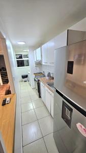 Departamento amplio con balcón y vista a la ciudad y la bahía