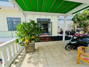 Khách Sạn View Biển - Homestay Sân Vườn - QUANG VINH Đảo Lý Sơn -Vị Trí Trung Tâm Đảo - Cạnh Bến cảng và Quảng trường