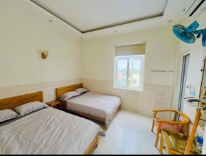 Khách Sạn View Biển - Homestay Sân Vườn - QUANG VINH Đảo Lý Sơn -Vị Trí Trung Tâm Đảo - Cạnh Bến cảng và Quảng trường