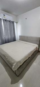 SMDC STYLES - King-Size Bed, Building C, Free Netflix, ILOILO CITY