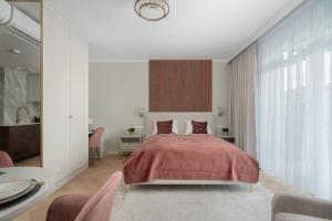 Two Luxury Studios with Balconies & Air Conditioning and a Rooftop Terrace in Ciechocinek by Renters Prestige