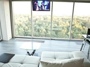 Apartment Wohnung mit Panoramaverglasung und Meerblick by Interhome