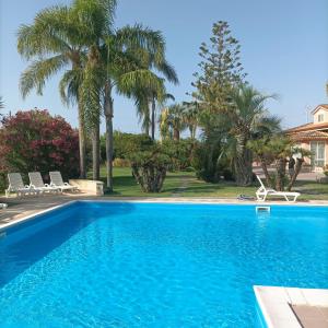 Zeus Depandance in Villa con piscina