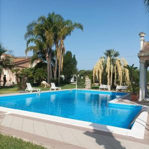 Zeus Depandance in Villa con piscina