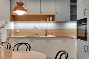 Blue Harmony 4 Bedrooms near ERGO Arena & Free Parking by OneApartments