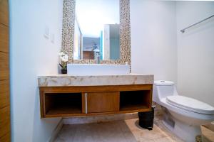 Luxury 1BR with Rooftop Pool in Prime Playa Location