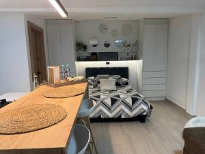 Suite Moderno y Acogedora con Ubicación Ideal de un solo ambiente