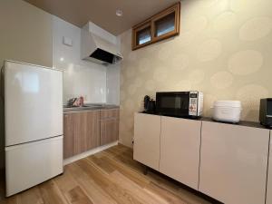 Mizuishi 5-minute walk from Tsuruhashi Station Detached house Japanese-style room with tatami mats,Maximum 5 people ,Namba 6 minutes, Tennoji 6 minutes ,Kansai Airport,Nara , JR,Kintetsu, Sennichimae