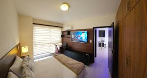 Apartatamento céntrico con piscina y vista