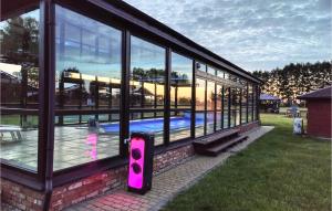 Nice Home In Darlowo With Sauna