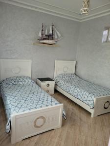 Appartement climatisé au 1er étage dune villa