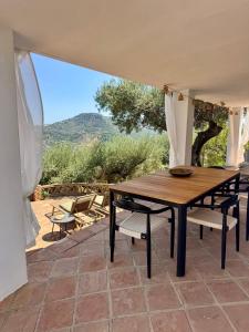 La Casita by Finca Maran met veranda, airco en gedeeld zwembad op kleinschalige Olijf Finca Adults Only