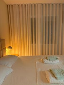SunKissed Sky Apartment - Qerret Golem - New Modern