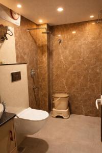 Hotel Atlantiis Suites By Signature StayZ Rathyatra Near Vishwanath Temple