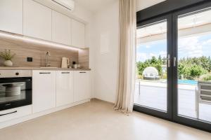 Sani Astera Deluxe Villas by RentalsPro - Sani Halkidiki