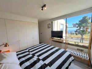 Departamento boutique, vista al mar, piscina y chimenea