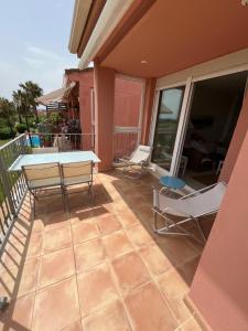 Condo with golf course views, pool and terraces