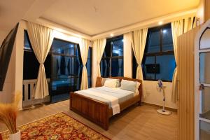 8-Suite Diani Villa with Private Kitchens, Pool, Gazebo, Pergola & 600m from the beach