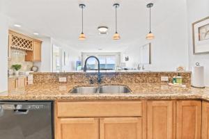 Oceanfront Seagate Condo with Heated Pool