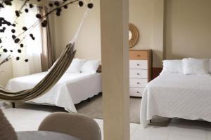 Zenda Loft, garden view, close to the beach
