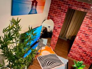 Terra Unit Vintage Brick Studio Makati Stay