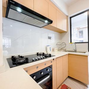 newly furnished two bedroom apartment with swimming pool, fully equipped gym, private parking space,children playground and unbeatable scenic city views