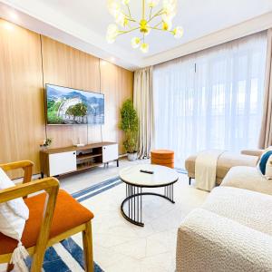 newly furnished two bedroom apartment with swimming pool, fully equipped gym, private parking space,children playground and unbeatable scenic city views