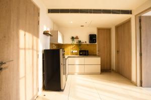 The Autumn House 2BHKACNr Medanta30min Airport