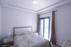 Charming 1-Bedroom Apartment in Martil with pool