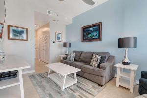 Casual beachfront getaway with pool ocean views & beach access