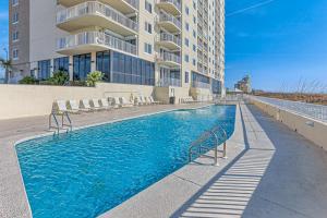 Beachfront condo with stunning views pool and washer dryer