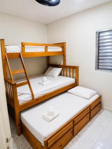 Apartamento Praia Grande Ubatuba, Piscina, Ar-Condicionado, Wi-Fi e Garagem, Até 8 Pessoas