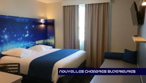 Hotels Kyriad Poitiers Jules Verne Site du Futuroscope : Chambre Triple