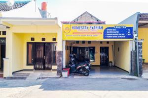 Homestay Nangkaan Estate Mitra RedDoorz