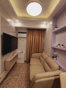 Cozy Condo with pool in Charm SMDC Cainta Pasig Marikina by Aryatastic Staycation