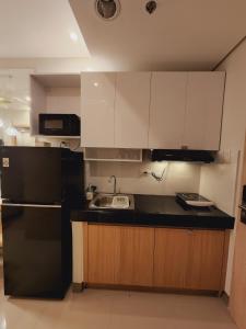Cozy Condo with pool in Charm SMDC Cainta Pasig Marikina by Aryatastic Staycation