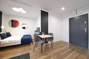 A very cozy apartment with a large bed