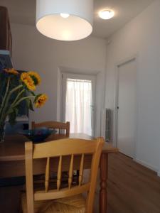 Appartamento con giardino e posto auto privato