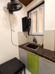 Cozy 1BHK Penthouse Prime Location