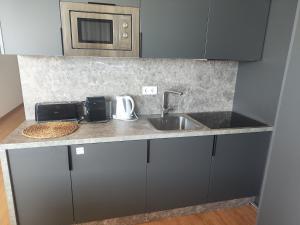 B-Apartamento 2 dormitorios con vistas panorámicas al Mediterráneo -Paseo Marítimo Marbella